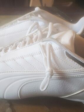 Puma All-White Low-Top Sneakers